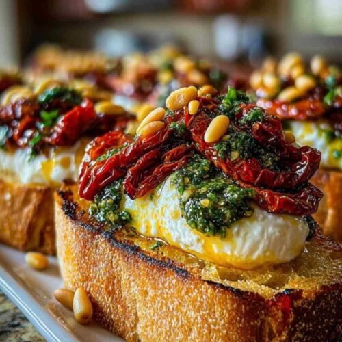 Bruschettas aux tomates confites et burrata avec pesto de basilic frais
