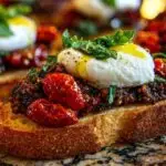 Ingrédients pour la recette de bruschetta : baguette, burrata, tomates confites, ail, citron et basilic.